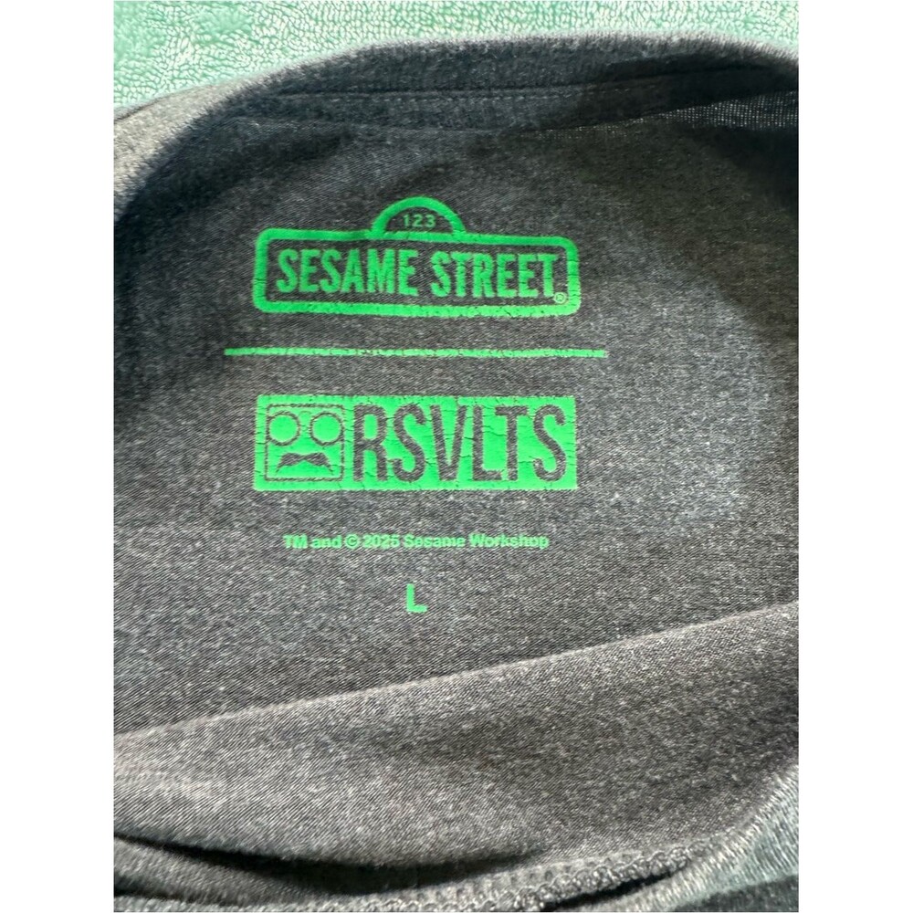 RSVLTS | Sesame Street Large Black Tee with Multicolor Lettering